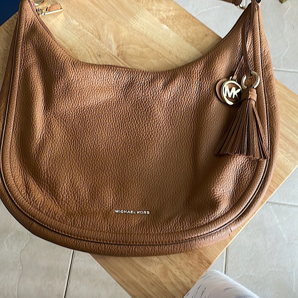 Color is a Rich brown Michael Kors